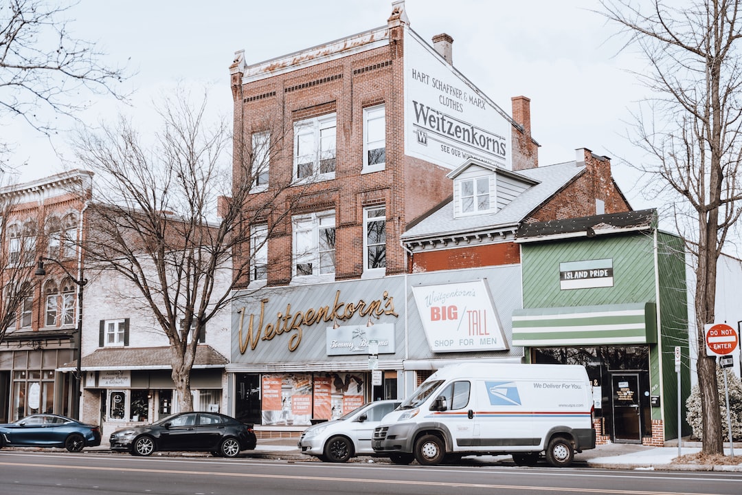 Brand Your Business with Commercial Wraps Local town with branded business vehicle