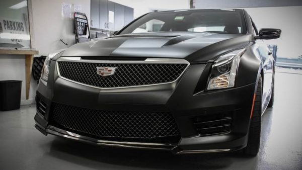 Black Satin Vehicle Wrap on a Cadillac