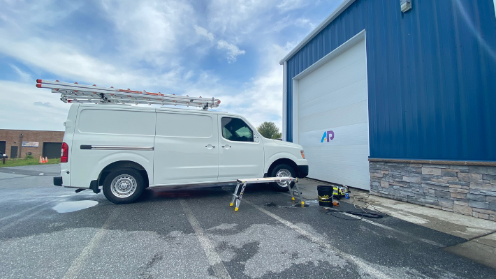 White van in front of AP Auto Bay