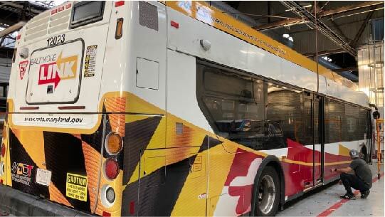 Custom bus wrap installed on a Maryland public transit bus