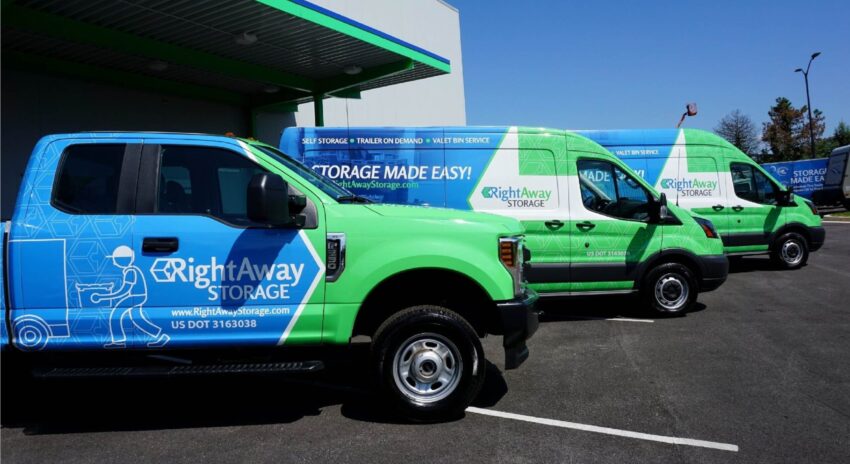 Company vans and truck with vinyl fleet wraps installed for Right Away Storage