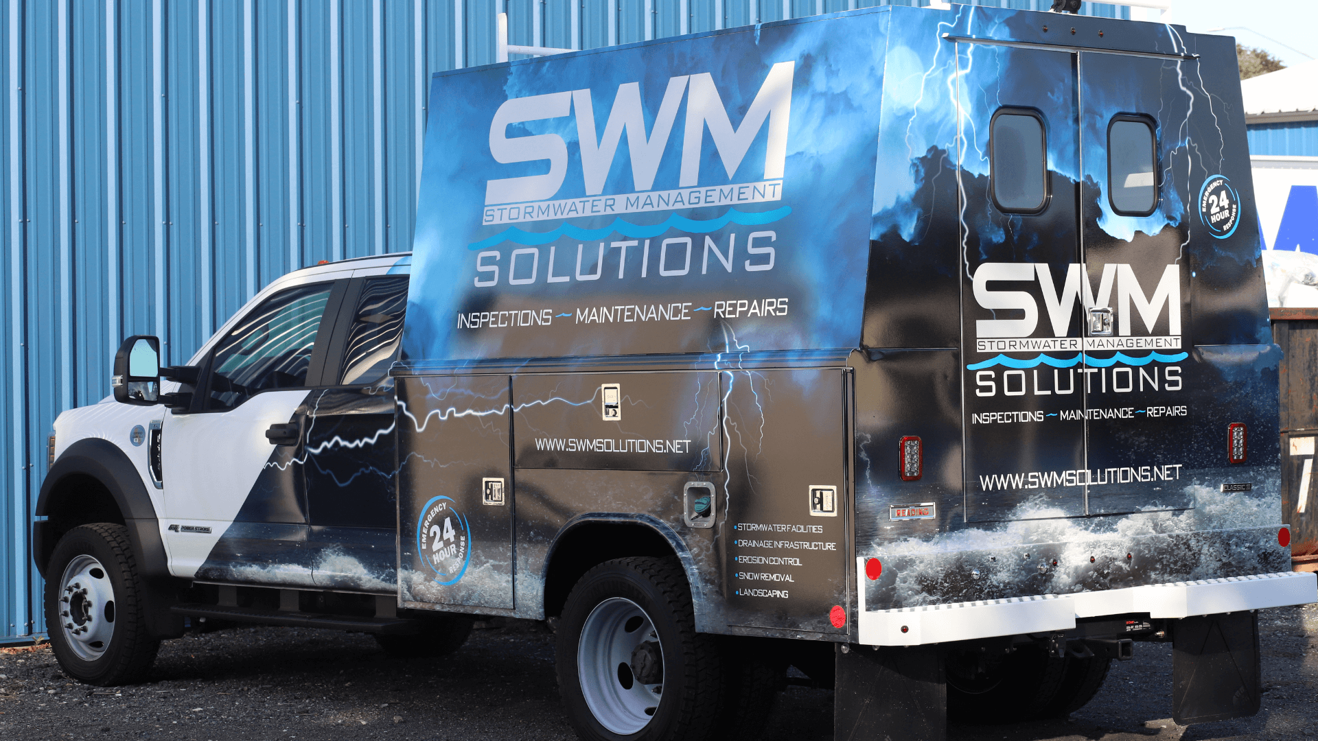 white box truck with swm storm water lighting wrap