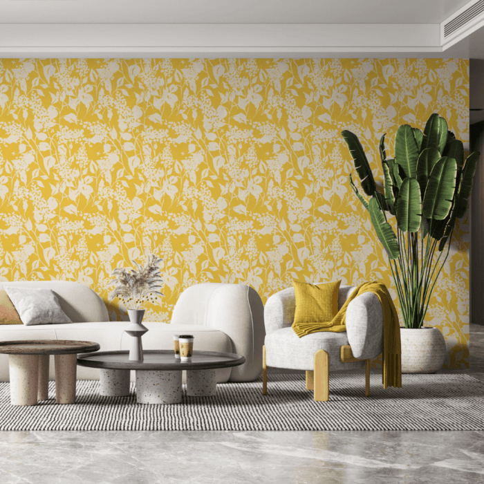 Lounge area with a yellow and white floral patterned peel and stick wallpaper