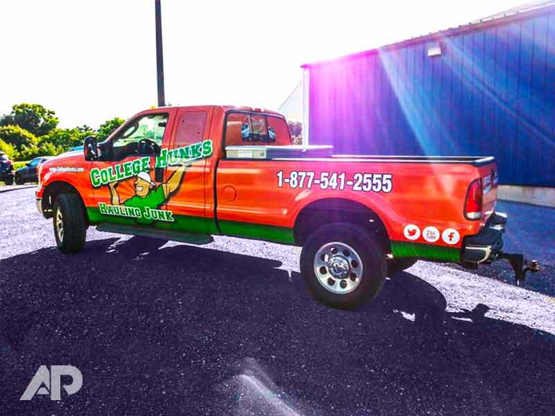 College Hunks Truck Wrap – Left Back View College Hunks Hauling Junk fleet wrap left back angle