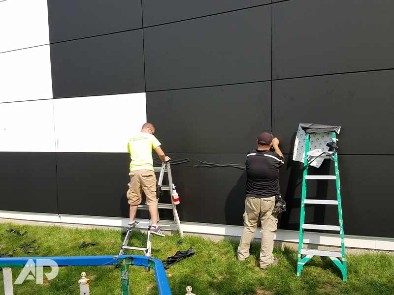 Mini Dealership Building Wrap Installation Process by Ap Wraps
