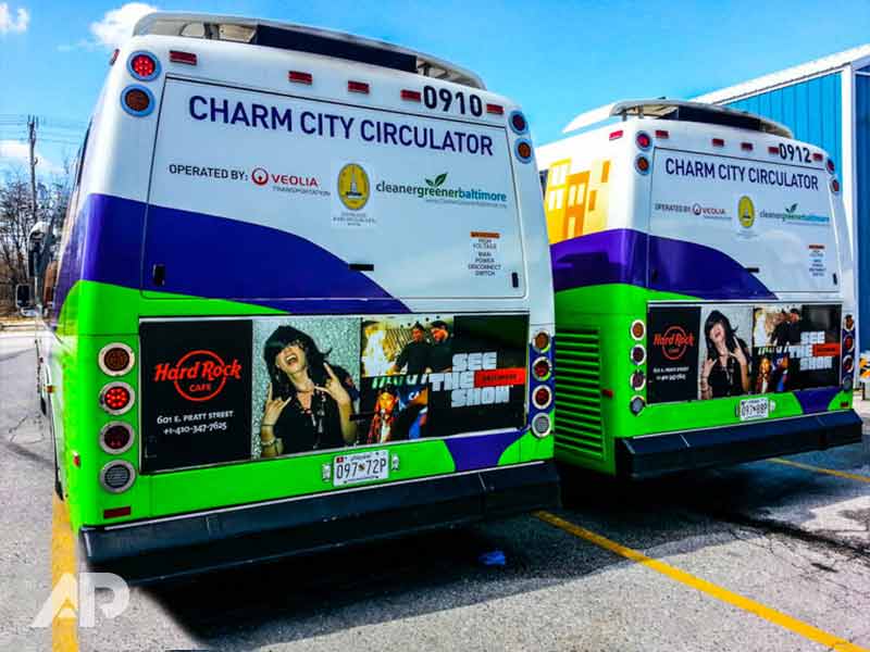 Rear view of Charm City Circulator fleet bus wraps in Baltimore