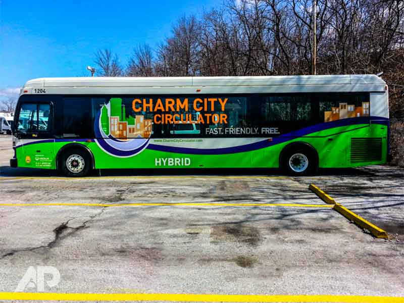 Left side view of Charm City Circulator fleet bus wraps in Baltimore