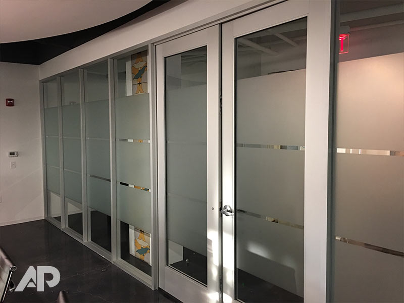 Frosted vinyl window film applied to Trade Pacific office by AP Wraps