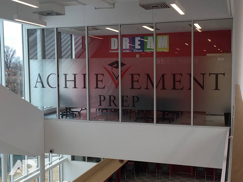 Achievement Prep frosted window film with custom graphics installation