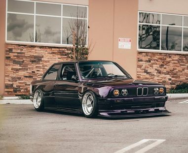 Super gloss vehicle wrap on a sports car with a high-shine finish