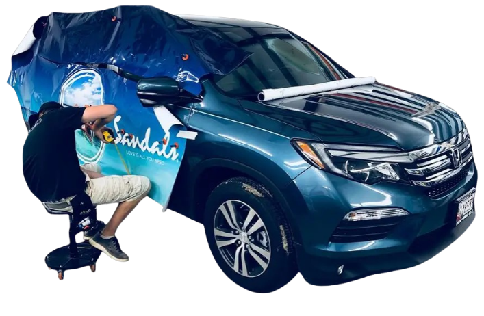 florida-vehicle-wrapping-service-professional Professional vehicle wrap installation in Florida showing detailed application process