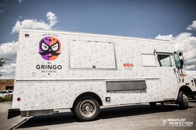 Full vinyl wrap signage covering an entire food truck