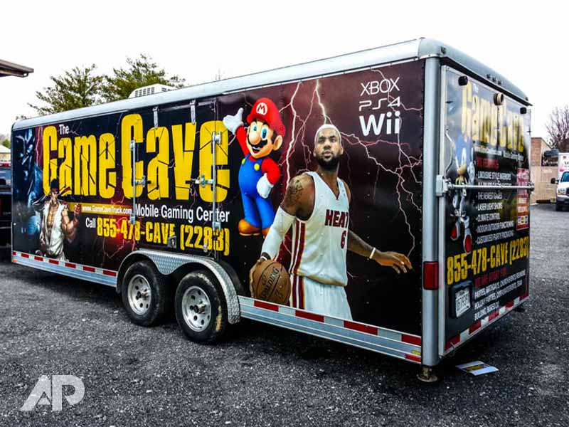 Game Cave trailer wrap showcasing gaming graphics