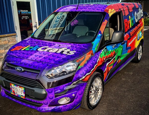 LEGO vehicle wrap on custom car showcasing colorful BrickCrafts design