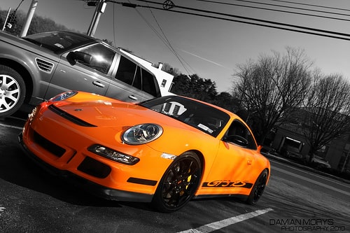 Orange Porsche 911 GT3 RS high-performance sports car