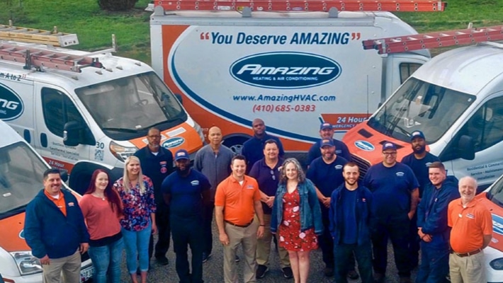 Amazing Heating & Air Conditioning fleet of service vans wrapped with custom HVAC branding graphics