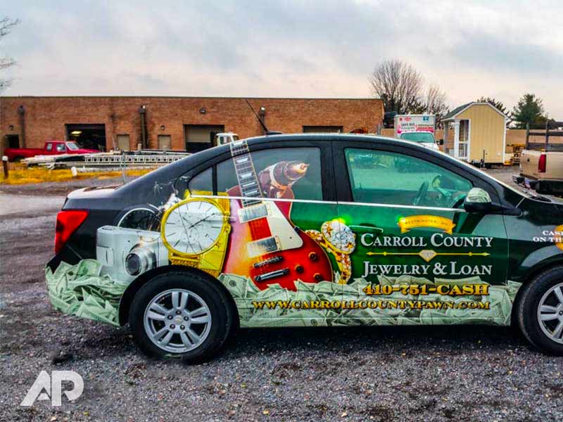 Chevy Sonic vehicle wrap for Carroll County Jewelry & Loan