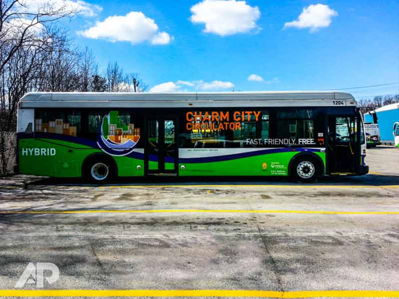 Right side view of Charm City Circulator fleet bus wraps in Baltimore