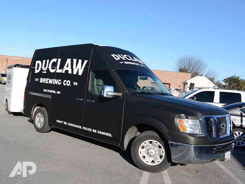 DuClaw truck advertising wrap front and right view