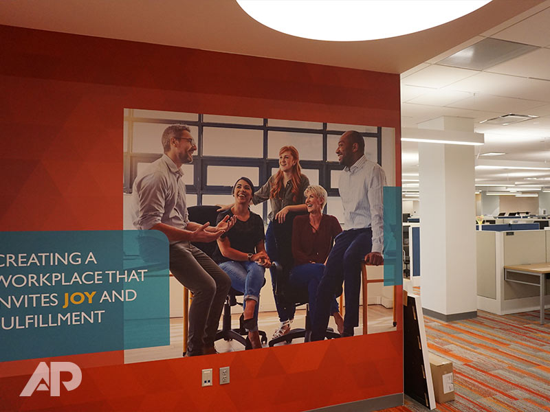 Red Johns Hopkins hospital wall mural with creative installation design