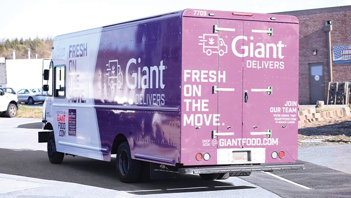 Nationwide fleet rebranding with custom vehicle wraps and certified installation