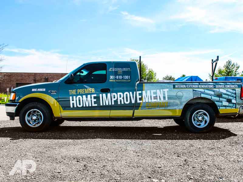 Left side view of Attention to Detail Maintenance pickup truck wrap