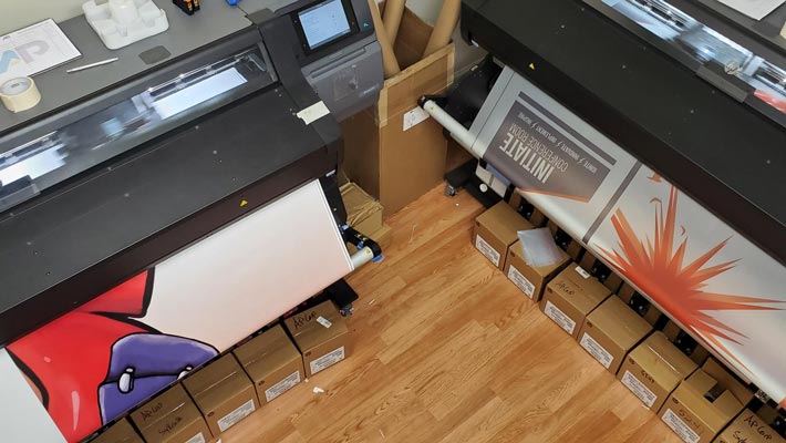 Protecting vehicle wraps with overlaminate for enhanced durability