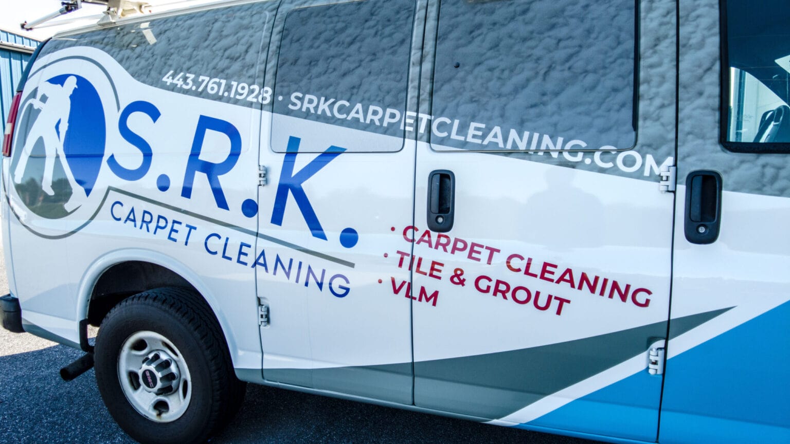 SRK Carpet Cleaning fully wrapped white fleet vehicle