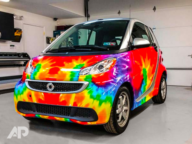 Front view of tie dye Smart Car custom wrap