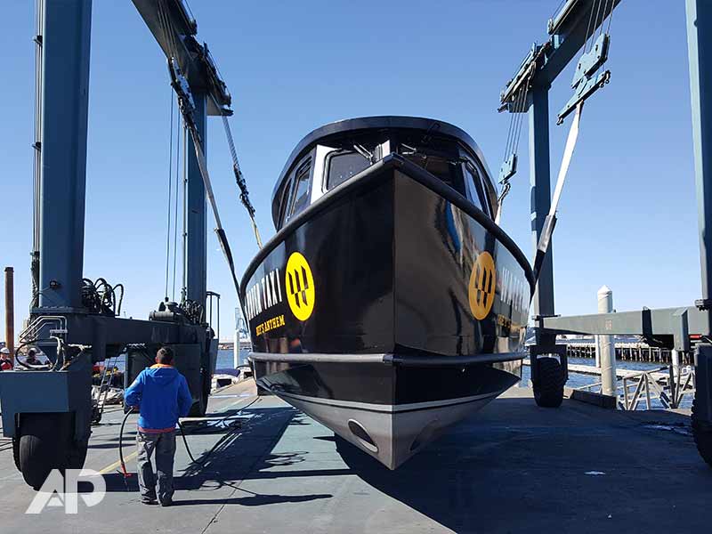 Front view of Under Armour boat wrap on Baltimore water taxi