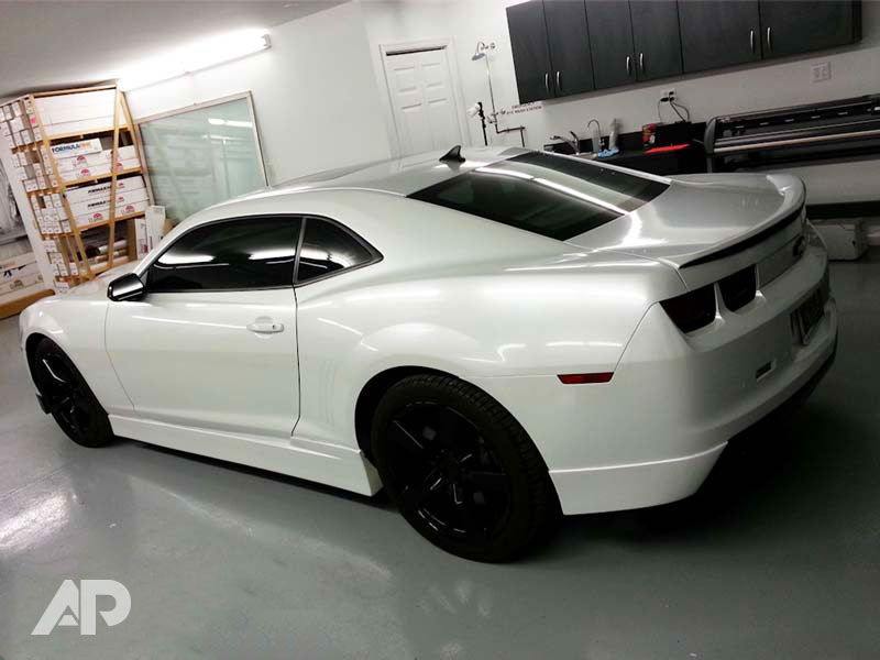 Pearl White Camaro back left view color change wrap