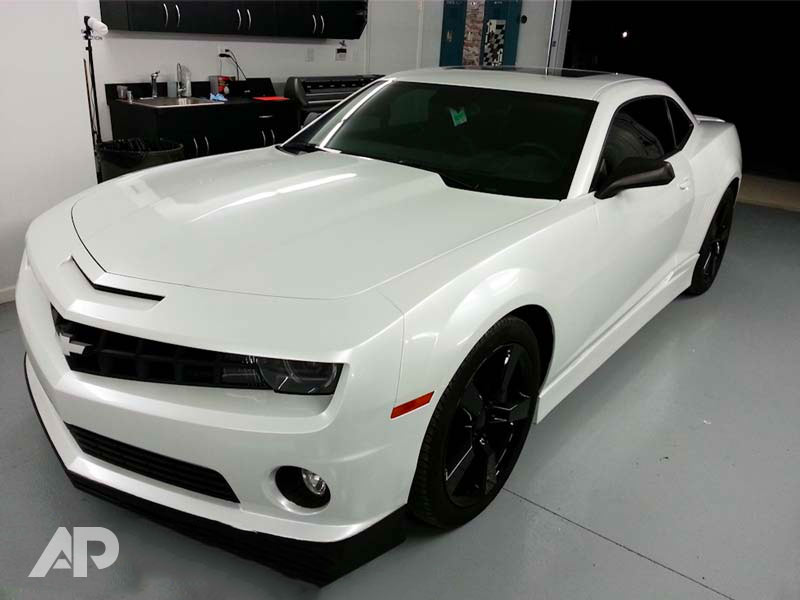 Pearl White Camaro front left view color change wrap