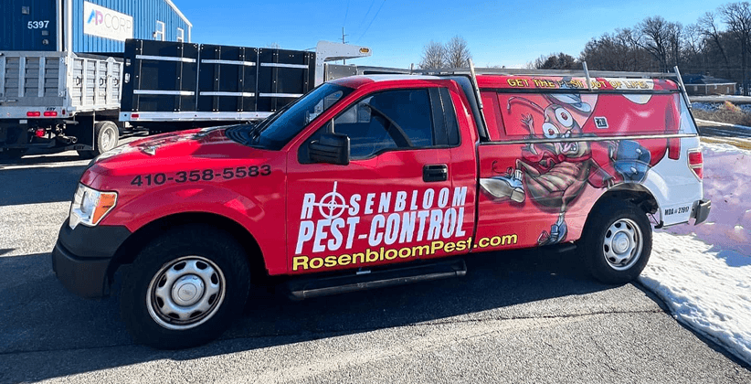 Rosenbloom Pest Control Truck with Full Wrap Graphics Full vehicle wrap on Rosenbloom Pest Control pickup truck with bold graphics